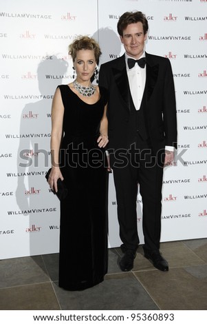 Gillian Anderson and William Banks-Blaney arrives for the William Vintage dinner hosted by Gillian Anderson at the Renaissance Hotel St Pancras, London. 10/02/2012 Picture by: Steve Vas / Featureflash