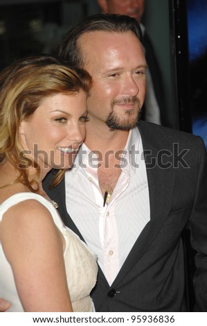 TIM McGRAW & wife FAITH HILL at the Hollywood Film Festival\'s opening night gala premiere of his new movie \