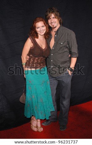 Actress BRIGID BRANNAGH & husband at the premiere for season three of the TV series Nip/Tuck, at the El Capitan Theatre, Hollywood. September 10, 2005  Los Angeles, CA  2005 Paul Smith / Featureflash