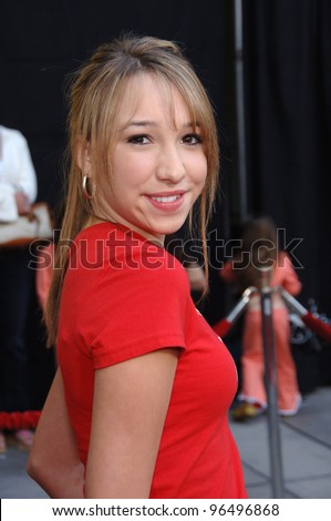 Actress ASHLEY EDNER at the world premiere, in Hollywood, of the animated movie Curious George. January 28, 2006  Los Angeles, CA  2006 Paul Smith / Featureflash