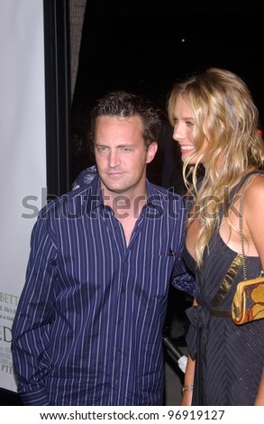 Actor MATTHEW PERRY & Wimbledon champion MARIA SHARAPOVA at the world premiere, in Beverly Hills, of the new tennis romantic comedy Wimbledon. September 13, 2004