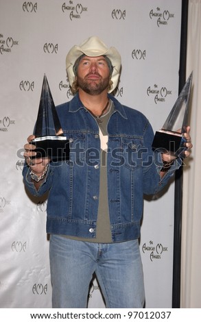 Nov 14, 2004; Los Angeles, CA: Country singer TOBY KEITH at the 32nd Annual American Music Awards at the Shrine Auditorium, Los Angeles, CA.