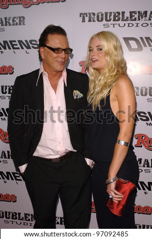 Actress JAIME KING & actor MICKEY ROURKE at the Los Angeles premiere of their new movie Sin City. March 28, 2005 Los Angeles, CA.  2005 Paul Smith / Featureflash