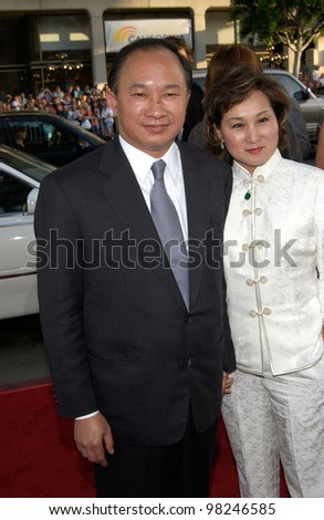 Director/producer JOHN WOO & wife at the Los Angeles premiere of his new movie Windtalkers. 11JUN2002.  Paul Smith / Featureflash