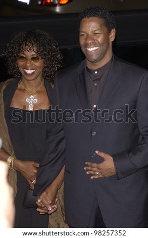 Actor DENZEL WASHINGTON & wife at the Broadcast Film Critics 8th Annual Critics\' Choice Awards at the Beverly Hills Hotel. 17JAN2003.   Paul Smith / Featureflash