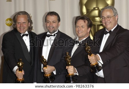 Visual Effects winners JIM RYGIEL (left), JOE LETTERI, RANDALL WILLIAM COOK & ALEX FUNKE at the 75th Annual Academy Awards at the Kodak Theatre, Hollywood. March 23, 2003