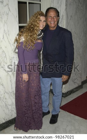 Infomercials star RON POPEIL & wife at the Wellness Community of West Los Angeles Human Spirit Awards Gala, at the Regent Beverly Wilshire Hotel, Beverly Hills. March 26, 2003