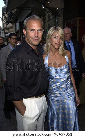 Actor KEVIN COSTNER & girlfriend at screening in Cannes of his new movie Open Range. 17MAY2003