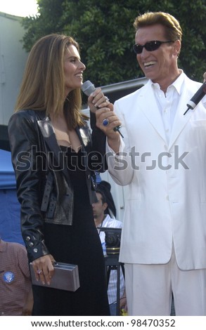 Actor ARNOLD SCHWARZENEGGER & wife TV presenter MARIA SHRIVER at the world premiere of his new movie Terminator 3: Rise of the Machines, in Los Angeles. June 30, 2003  Paul Smith / Featureflash