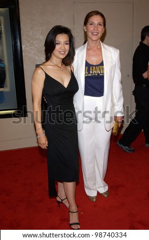 Actresses MING-NA WEN (left) & PERI GILPIN at the world premiere, in Los Angeles, of their new movie Final Fantasy: The Spirits Within. 02JUL2001.  Paul Smith/Featureflash