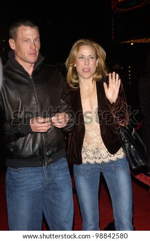 Cyclist LANCE ARMSTRONG & singer SHERYL CROW at the world premiere, in Hollywood, of Along Came Polly. January 12, 2004