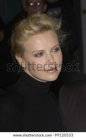 Actress CHARLIZE THERON at the world premiere of Shade, in Hollywood. April 6, 2004