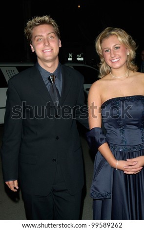 Pop star LANCE BASS of \'NSync & singer MEREDITH EDWARDS at the Country Music Assoc. Awards at the Grand Ole Opry in Nashville, TN. 04OCT2000.  Paul Smith/Featureflash