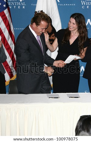 Arnold Schwarzenegger, Julia Ormond at the Official Signing of California Senate Bill 657, Museum Of Tolerance, Los Angeles, CA. 10-18-10