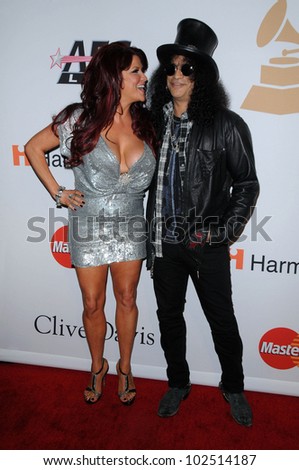 Slash and Wife Perla  at The Recording Academy and Clive Davis Present The 2010 Pre-Grammy Gala - Salute To Icons, Beverly Hilton Hotel, Beverly Hills, CA. 01-30-10
