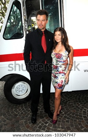 Josh Duhamel and Stacy Ferguson at the Red  Cross Red Tie Affair Fundraiser Gala, Fairmount Miramar Hotel, Santa Monica, CA. 04-17-10