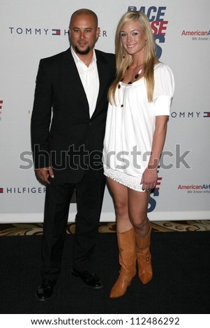 Cris Judd and guest at the 14th Annual \