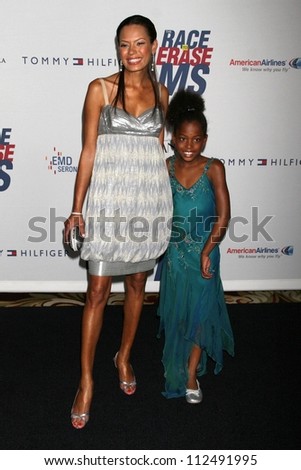 Keisha Whitaker and guest at the 14th Annual \