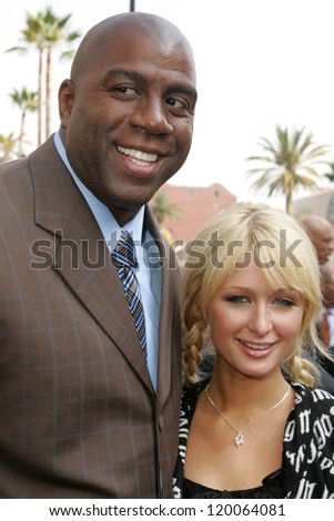 Magic Johnson and Paris Hilton at the Ceremony Honoring Los Angeles Lakers Owner Jerry Buss with the 2,323rd star on the Hollywood Walk of Fame. Hollywood Boulevard, Hollywood, CA. 10-30-06