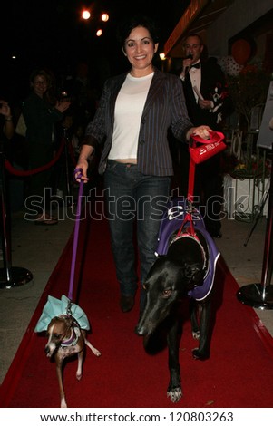 Jane Wiedlin and dogs Geordie and Peanut at the first annual Beverly Hills Mutt Club Fashion and Halloween Show, Beverly Hills Mutt Club, Beverly Hills, CA 10-22-06