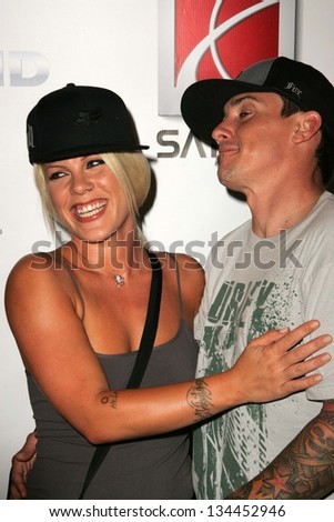 HOLLYWOOD - AUGUST 02: Pink and Carey Hart at Saturn's X-Games 12 Party at 6820 Hollywood Blvd on August 02, 2006 in Hollywood, CA.