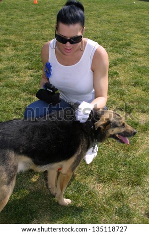 WOODLAND HILLS - APRIL 30: Joanie Laurer at the Nuts For Mutts Dog Show at Pierce College on April 30, 2006 in Woodland Hills, CA.