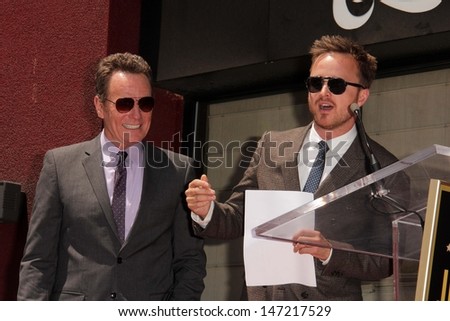 Bryan Cranston and Aaron Paul at the Bryan Cranston Star on the Hollywood Walk of Fame Ceremony, Hollywood, CA 07-16-13