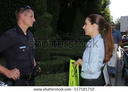 Kerri Kasem talks to the police at a protest involving Casey Kasem\'s children, brother and friends who want to see him but have been denied any contact,  Private Location, Holmby Hills, CA 10-01-13
