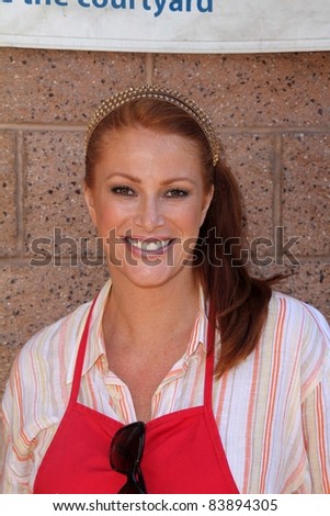 Angie Everhart at the Skid Row Block Party at the Los Angeles Mission, Los Angeles, CA. 08-27-11