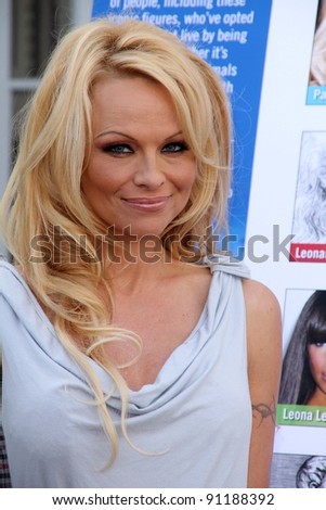 Pamela Anderson at the PETA Goes Postal Postage Stamp Unveiling, Hollywood Post Office, Hollywood, CA 11-29-11