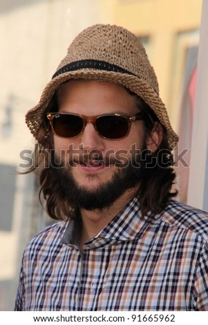 Ashton Kutcher at Jon Cryer\'s induction into the Hollywood Walk of Fame, Hollywood, CA. 09-19-11