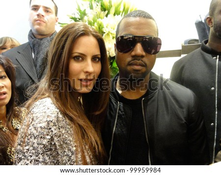Kerri Kasem and Kanye West  outside the Giuseppe Zanotti Boutique Opening, Giuseppe Zanotti Boutique, Beverly Hills, CA. 02-04-11