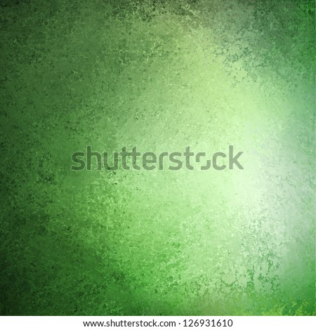 abstract green background pastel Easter color or spring color of mint green, faint vintage grunge background texture gradient design, bright whiter center spot, old green paper faded darker edges