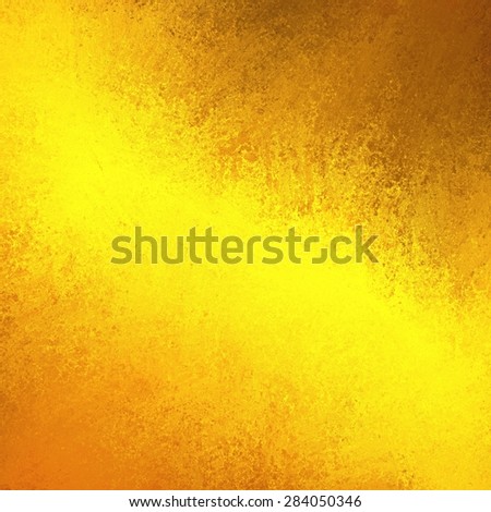 brilliant yellow gold color splash on golden brown background, gold grunge vintage texture