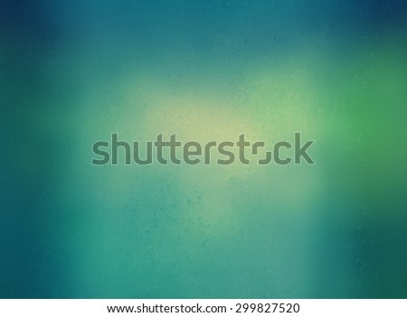 blurred blue sky background with vintage style filter effects, yellowed white bokeh lights blurred into blue green background color with dark border, abstract blurry background