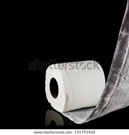 toilet paper isolated on black background