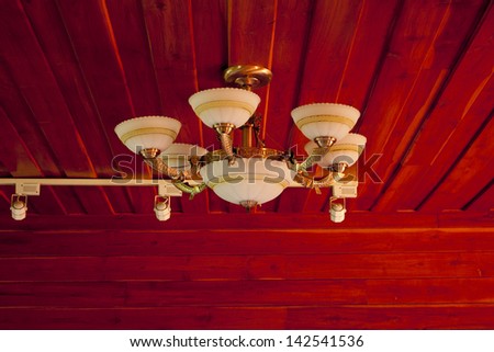 Vintage ceiling lamp fixture in dark hallway