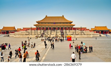 Beijing, China - Mar. 28, 2012: Local and foreign tourists visit the Hall of Supreme Harmony. Made entirely of wood, it is the largest hall in the Forbidden City, Beijing, China.