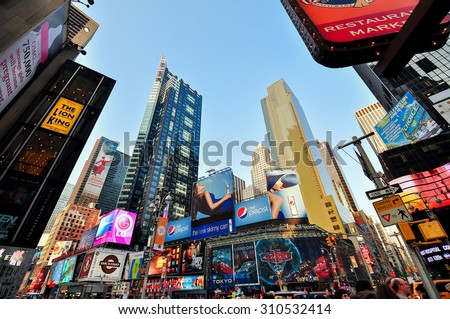 Manhattan, New York - Jun. 8, 2011: Times Square in late afternoon. Times Square is a major commercial intersection and neighborhood in midtown Manhattan, at the intersection of Broadway and 7th Av.