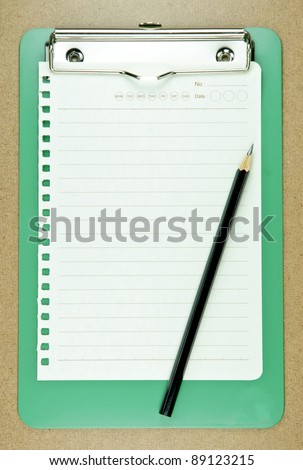 Paper on Clip board with Pencil