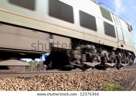Fast moving cargo train with stock in Europe