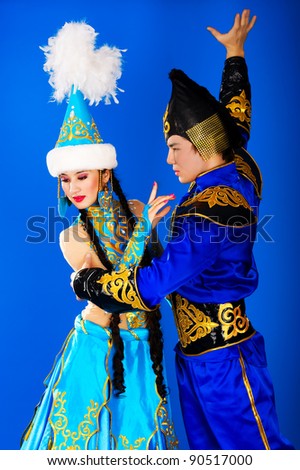 Boy and girl in the Kazakh national costumes