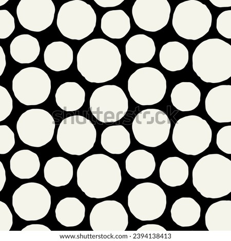 Vector seamless pattern. Abstract spotty texture. Natural monochrome design. Creative background with rough circles. Decorative creative swatch. Simple hand drawn polka dots.