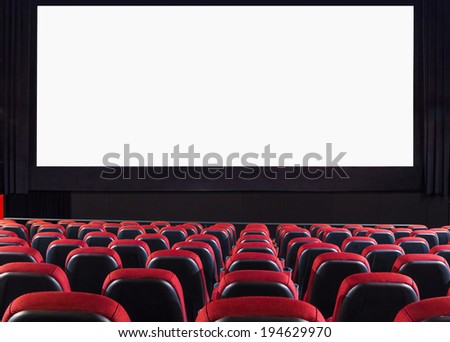 Empty cinema auditorium with screen and seats