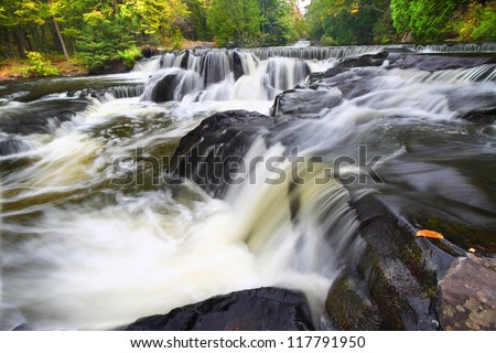 Bond Falls flows through the forests of northwoods Michigan