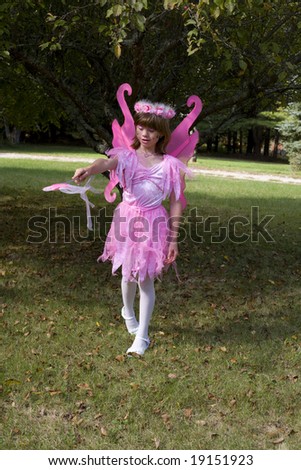 Child dressed as a Pink Fairy
