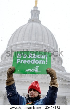 MADISON, WI - FEB 26: Union supporter  in Wisconsin in a rally against Governor Scott Walker\'s budget on Feb 26, 2011. Walker has won the recall election, but he still faces a new election next year