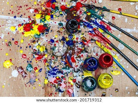 Color bottle and dirty splash on artwork desk