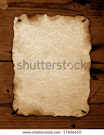 Old paper with burned edges for background