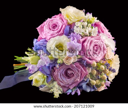 Vivid floral arrangement with mauve roses and Hydrangea Hortensis, wedding bouquet, isolated, black background